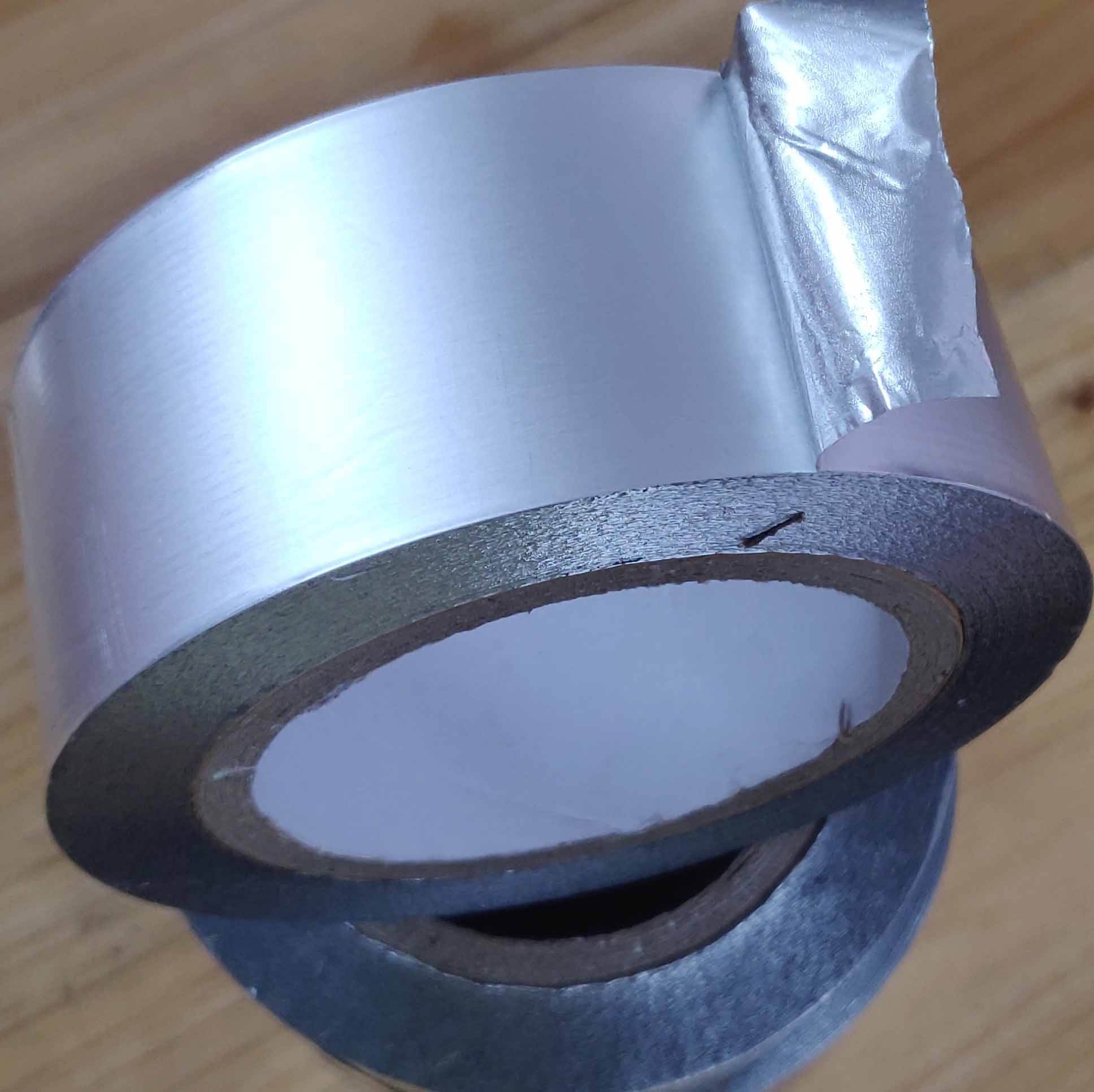 Linerless aluminum tape